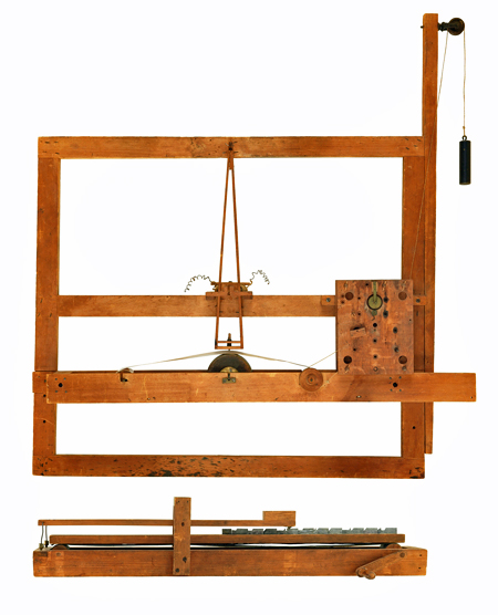 Samuel Morse created his patent model for the telegraph from a wooden artist’s canvas stretcher. A clockwork mechanism attached to the stretcher moved a paper tape that was inked in correspondence with the hand-cranked sawtooth device holding the type.