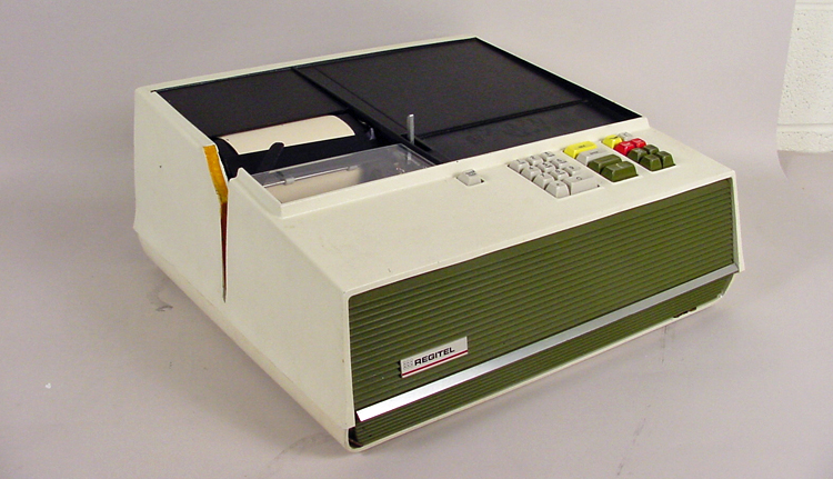 Rectangular black-and-beige plastic box with keypad on right and register tape on left.