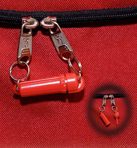 Close-up of the Zip-R-Lok security clasp on a red bag
