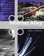 Cover of Internet Alley High Technology in Tysons Corner, 1945-2005, showing fighter jets, a computer screen, heavy traffic at night in an urban area, and fiber optics cables, with an overlay of a traffic roundabout outline.