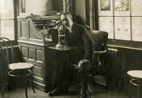 Photo of Charles Pratt in his office around 1900