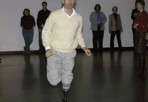 Photo of Van Phillips running using his invention, the Flex-Foot