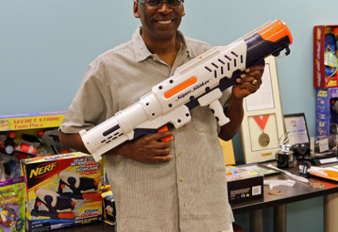 Lonnie Johnson with Super Soaker and Nerf toys