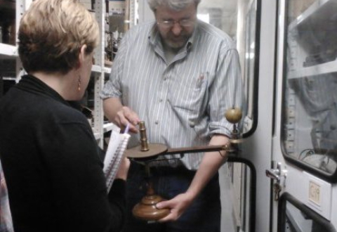 Curator Steve Turner with a scientific instrument