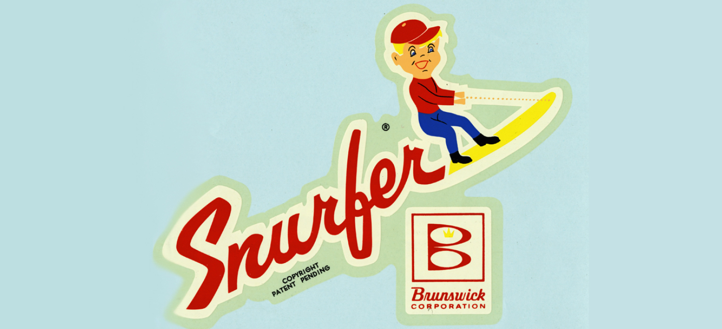 Decal depicting a cartoon boy riding a Snurfer