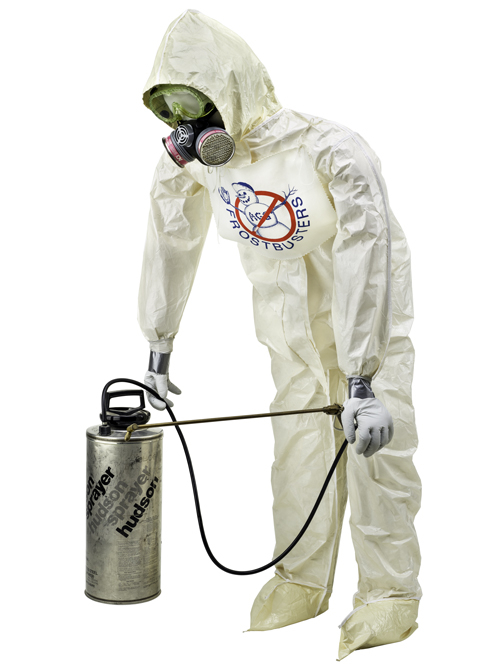 Mannequin wearing a protective jumpsuit and holding a spray canister, both used in the first release of GMOs into the environment in 1987