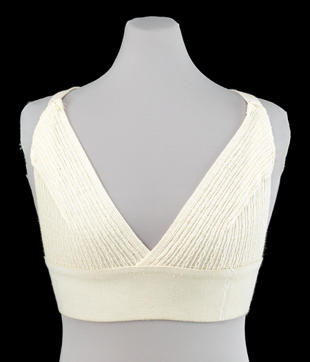 Prototype of the original Jogbra on a half-torso mannequin. The prototype was made from two desconstructed men’s athletic supporters that were then sewn together onto a wide elastic band, with two narrow pieces of stockinette straps sewn onto the elastic band and the athletic supporters.