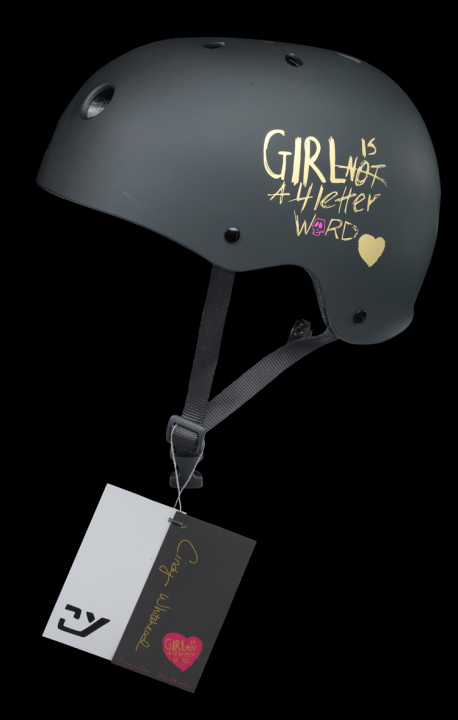 Skateboard helmet has a black matte finish with &quot;Girl [/] is [/] NOT [/] A 4 letter [/] Word&quot; in gold with a gold heart and a pink skull on the left side of the helmet. &quot;XS&quot; is printed in gold on the front of the helmet. The helmet consists of a black styrofoam core with pink foam inserts and a black nylon chin strap with a black plastic buckle.