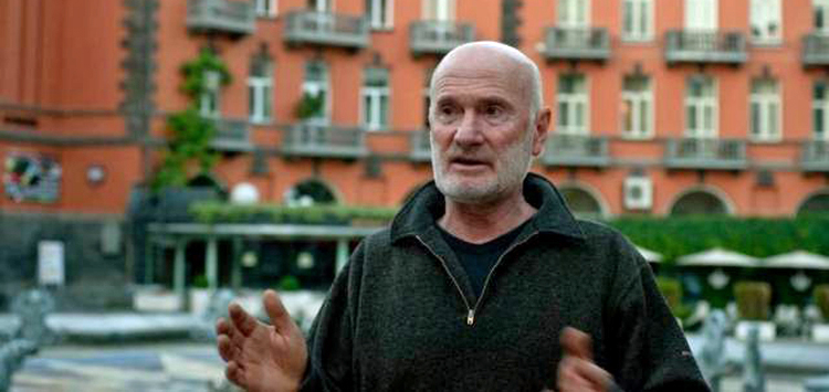 Ara Alekyan standing outside an unidentified building