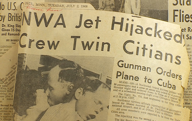 Faded newspaper clipping with headline “NWA Jet Hijacked”