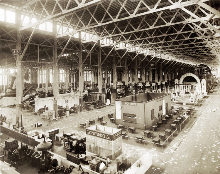 Overhead shot of the center of the Palace of Agriculture at the 1904 Worlds Fair with the Puffed Rice stand in the center foreground.