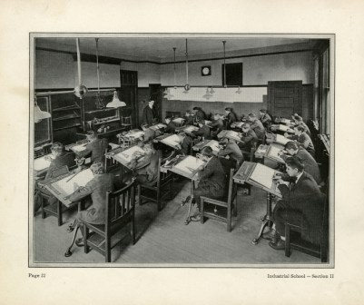 Archival photo of boys at their desks, 1911.