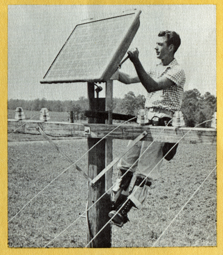 Bell Telephone technician on pole installing solar panel for telephone relay in 1958