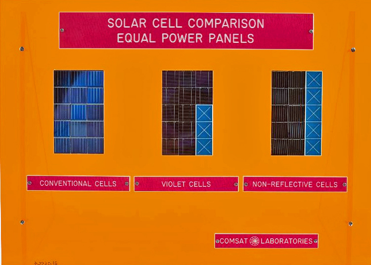 Comsat solar cell display comparing power outputs of different cells, around 1975