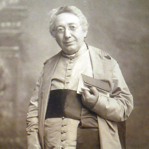 Section of full-length photo of Bouchet in clerical robes