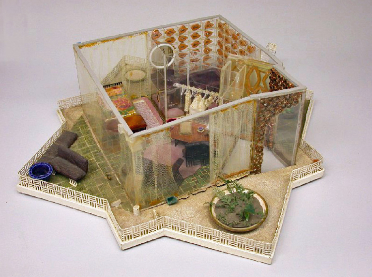 View looking down on model of self-cleaning house