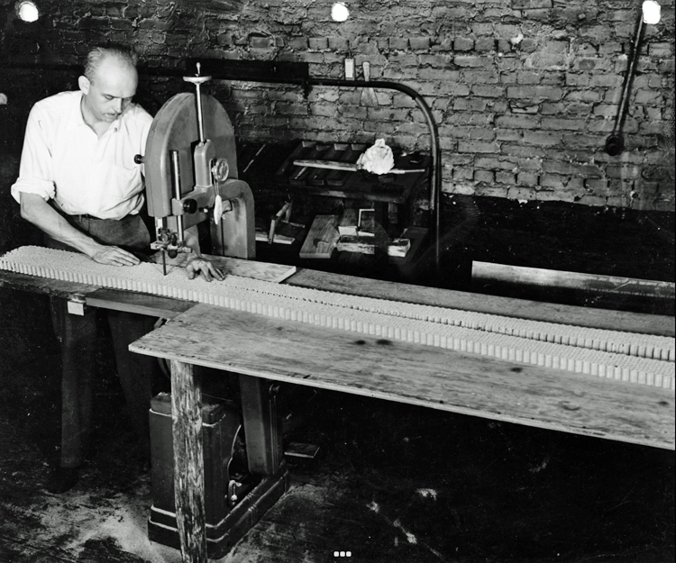 Howard Head cutting the honeycomb core for his skis.