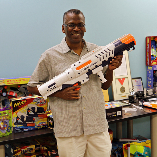 Lonnie Johnson with Super Soaker and Nerf toys