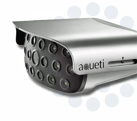 Side view of a wedge-shaped camera with multiple lenses at the wide end. Logotype for Aqueti is printed on the side of the camera.